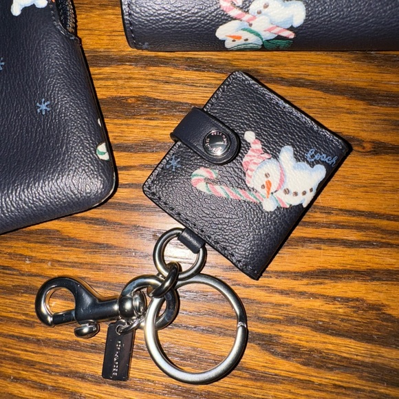 Coach Snowman Print Wallet, Wristlet, Picture Frame, & Makeup Bag Set - Picture 4 of 9